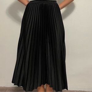 black silky pleated skirt